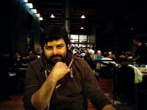 If you look close, there is a table of Mennonites sitting behind Alec.  